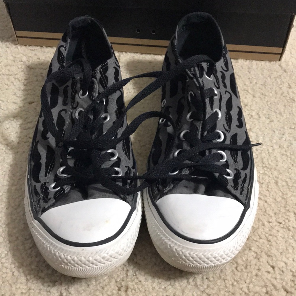 Gently worn mustache converse